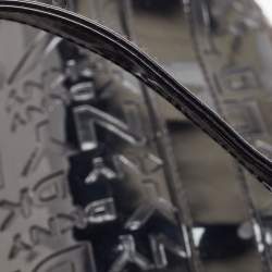 Pre Owned DKNY Black PVC Logo Embossed Shopper Tote