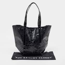 Pre Owned DKNY Black PVC Logo Embossed Shopper Tote