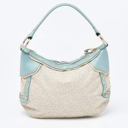 Pre Owned DKNY Cream/Blue Monogram Canvas and Leather Buckle Hobo