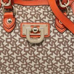 Pre Owned DKNY Orange/Beige Monogram Canvas and Leather Zip Satchel