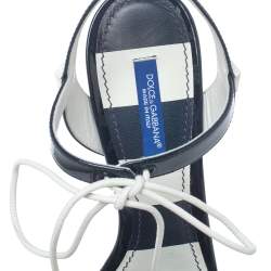 مملوكة مسبقًا Dolce & Gabbana Navy Blue/White Patent Leather Keira Ankle Tie Open Toe Sandals Size 37.5