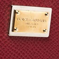 مملوكة مسبقًا حافظة أيباد دولتشي أند غابانا سحاب جلد محبب حمراء