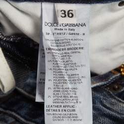 مملوكة مسبقًا بنطلون جينز دولتشي آند غابانا دينم ممزق أزرق بتفاصيل كريستال مقاس صغير - خصر 28 إنش