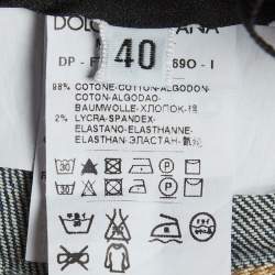 مملوكة مسبقًا بنطلون جينز دولشي أند غابانا دينيم أزرق بتفاصيل مستعملة محيط خصر 30 بوصة بحجم صغير