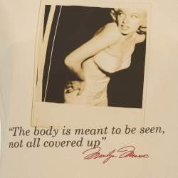 Pre Owned ```json
{"name_ar": "توب دولتشي أند غابانا × مارلين مونرو حرير مطبوع بيج مقاس متوسط"}
```