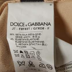 Pre Owned ```json
{"name_ar": "توب دولتشي أند غابانا × مارلين مونرو حرير مطبوع بيج مقاس متوسط"}
```