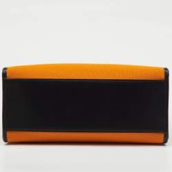 مملوكة مسبقًا حقيبة تسوق دولتشي أند غابانا قماش وجلد برتقالي/أسود بشعار مطرز