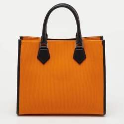 مملوكة مسبقًا حقيبة تسوق دولتشي أند غابانا قماش وجلد برتقالي/أسود بشعار مطرز