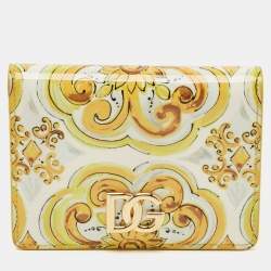 مملوكة مسبقًا Dolce & Gabbana Yellow Majolica Print Patent and Leather Flap Card Case