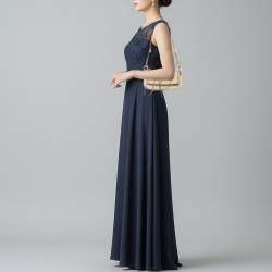 مملوكة مسبقًا حقيبة دولتشي أند غابانا كتف السبعينات بوهو شيك شامواه كريمي/بني فلاپ