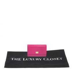 مملوكة مسبقًا محفظة دولتشى أند غابانا طية ثلاثية جلد نقش سحلية وردية