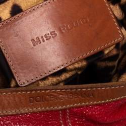 Pre Owned Dolce & Gabbana Red Shimmery Glossy Leather Miss Fluid Hobo