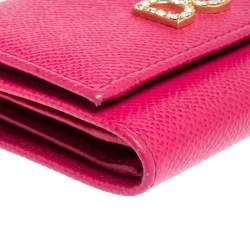 Pre Owned Dolce & Gabbana Fuchsia Leather DG Crystal Embellished Trifold Wallet