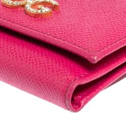Pre Owned Dolce & Gabbana Fuchsia Leather DG Crystal Embellished Trifold Wallet
