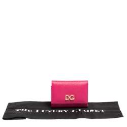 Pre Owned Dolce & Gabbana Fuchsia Leather DG Crystal Embellished Trifold Wallet