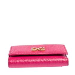 Pre Owned Dolce & Gabbana Fuchsia Leather DG Crystal Embellished Trifold Wallet