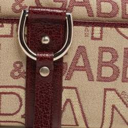 مملوكة مسبقًا Dolce & Gabbana Burgundy Monogram Fabric and Leather D Ring Trifold Wallet