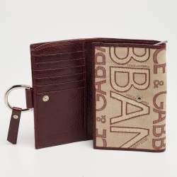 مملوكة مسبقًا Dolce & Gabbana Burgundy Monogram Fabric and Leather D Ring Trifold Wallet