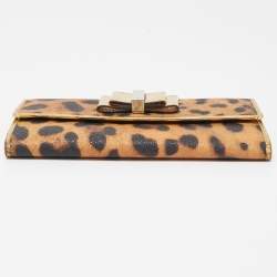 مملوكة مسبقًا Dolce & Gabbana Gold/Brown Leopard Print Coated Canvas and Laminated Leather Bow Flap Wallet