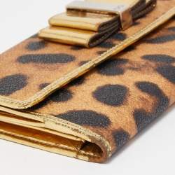 مملوكة مسبقًا Dolce & Gabbana Gold/Brown Leopard Print Coated Canvas and Laminated Leather Bow Flap Wallet