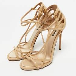 مملوكة مسبقًا صندل دولتشي أند غابانا جلد بيج/كريمي سير كاحل مقاس 38.5 