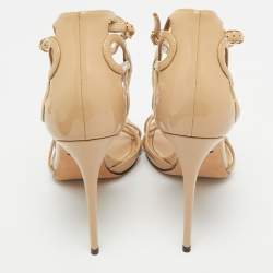 مملوكة مسبقًا صندل دولتشي أند غابانا جلد بيج/كريمي سير كاحل مقاس 38.5 