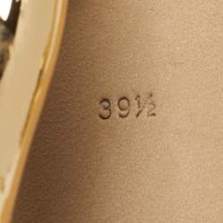 مملوكة مسبقًا صندل دولتشي وأند غابانا سيور كاحل كيارا جلد ذهبي مقاس 40