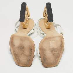 مملوكة مسبقًا صندل دولتشي وأند غابانا سيور كاحل كيارا جلد ذهبي مقاس 40