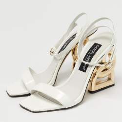 مملوكة مسبقًا صندل دولتشي وأند غابانا سيور كاحل كيارا جلد ذهبي مقاس 40