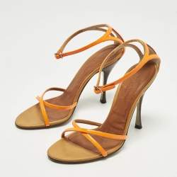 مملوكة مسبقًا صندل بحزام عند الكاحل دولتشي أند غابانا جلد لامع برتقالي نيون مقاس 37.5
