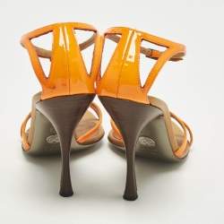 مملوكة مسبقًا صندل بحزام عند الكاحل دولتشي أند غابانا جلد لامع برتقالي نيون مقاس 37.5