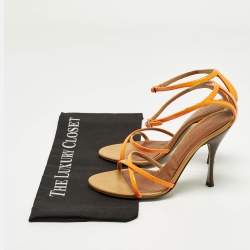 مملوكة مسبقًا صندل بحزام عند الكاحل دولتشي أند غابانا جلد لامع برتقالي نيون مقاس 37.5