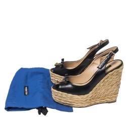 Pre Owned صندل دولتشي أند غابانا مزين قفل و فونكة كعب روكي و فتحة كعب رافيا و جلد أسود مقاس 38