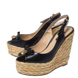 Pre Owned صندل دولتشي أند غابانا مزين قفل و فونكة كعب روكي و فتحة كعب رافيا و جلد أسود مقاس 38