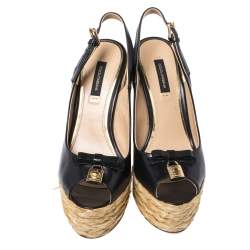 Pre Owned صندل دولتشي أند غابانا مزين قفل و فونكة كعب روكي و فتحة كعب رافيا و جلد أسود مقاس 38