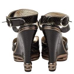 Pre Owned صندل دولتشي أند غابانا جلد  ثعبان أسود سيور متعاكسة نعل سميك مقاس 38