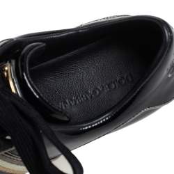 Pre Owned حذاء رياضي دولتشي آند غابانا جلد مخطط أسود لامع مقاس 35