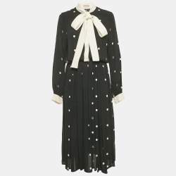 مملوكة مسبقًا فستان إيلي صعب أسود بكُرات قماش كريب ميدي مقاس وسط (ميديوم)