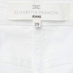 مملوكة مسبقًا بنطلون جينز إيسابيتا فرانكي قطن أبيض بتفاصيل سحر قفل سكيني مقاس وسط 29 متوسط