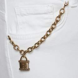 مملوكة مسبقًا بنطلون جينز إيسابيتا فرانكي قطن أبيض بتفاصيل سحر قفل سكيني مقاس وسط 29 متوسط