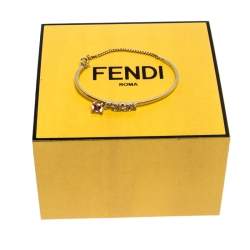 Pre Owned Fendi Gold Tone Crystal Embellished Logo Charm Bracelet S
