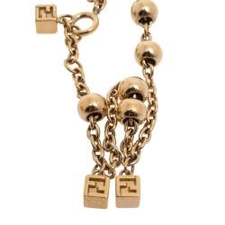 مملوكة مسبقًا سوار فندي ذهبي اللون بدلاية مكعب منقوشة وسلسلة 