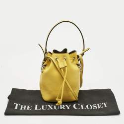 Pre Owned Fendi Yellow Leather Mini Mon Tresor Drawstring Bucket Bag