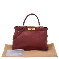 Pre Owned Fendi Metallic Ruby Red Selleria Leather Medium Peekaboo Top Handle Bag