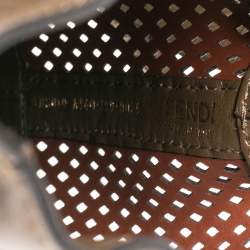 Pre Owned Fendi Khaki Green/White Perforated Leather Mini Mon Tresor Drawstring Bucket Bag