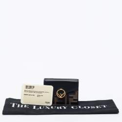 Pre Owned Fendi Black/Tobacco Zucca Embossed Leather Micro F is Fendi Trifold Wallet