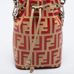 Pre Owned Fendi Beige/Red Monogram Embossed Leather Mini Mon Tresor Drawstring Bucket Bag