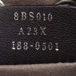 Pre Owned Fendi Beige/Red Monogram Embossed Leather Mini Mon Tresor Drawstring Bucket Bag