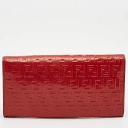 Pre Owned Fendi Orange Zucchino Patent Leather Mia Flap Continental Wallet
