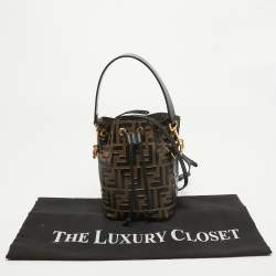 Pre Owned Fendi Brown/Black Zucca Leather Mini Mon Tresor Drawstring Bucket Bag